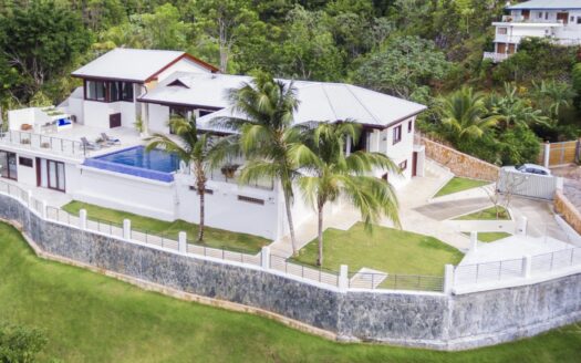 Exclusive Hilltop Villa with Panoramic Ocean and Mountain Views
